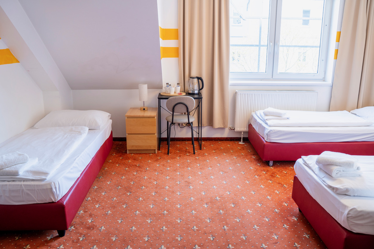 Dreibettzimmer